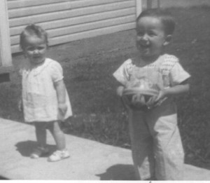 Bobby and Gary in front of Pat and Bessie Miracle's house on Superior St in Wrightview, Ohio